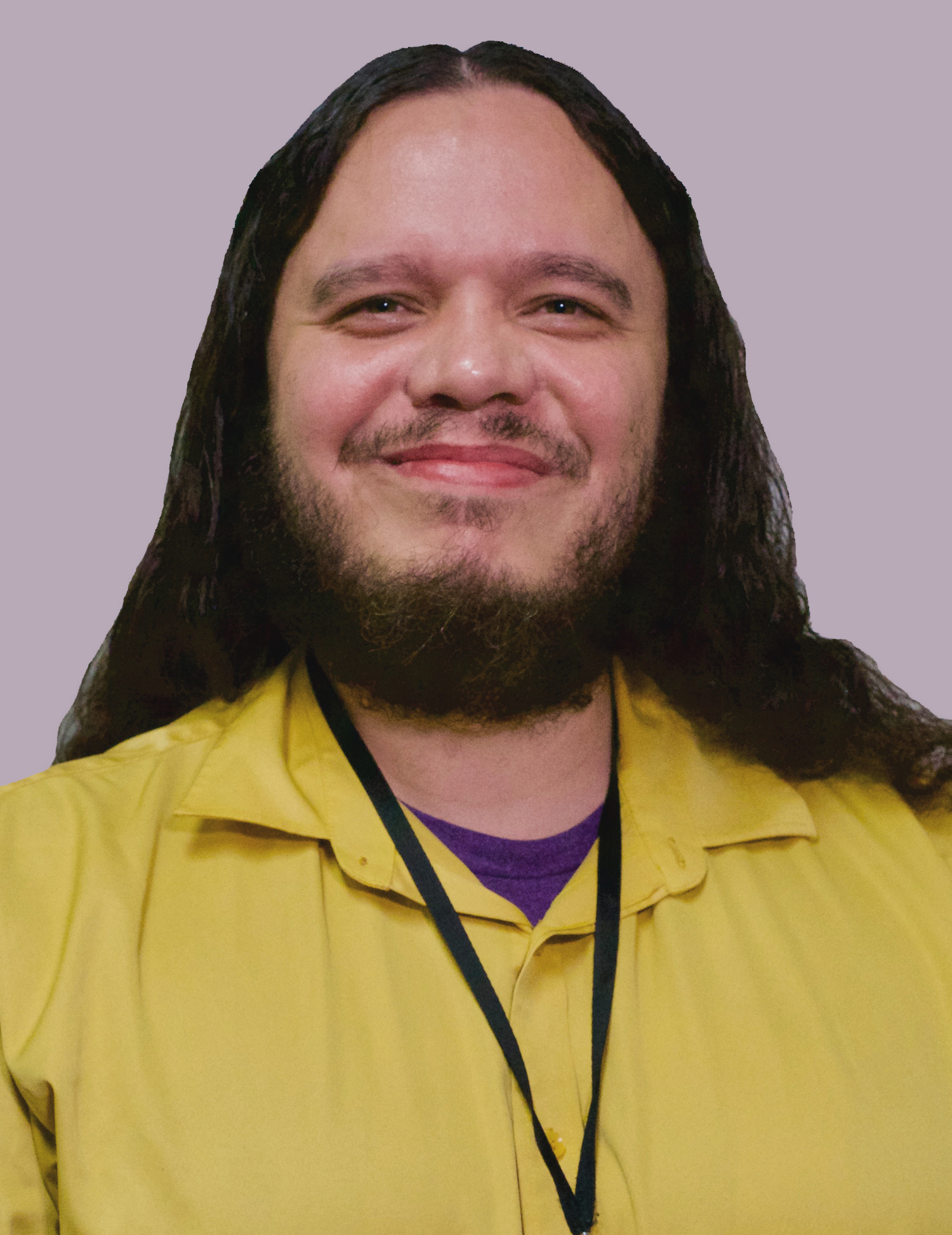 Damien Christopher Warsavage is wearing a yellow collared shirt.